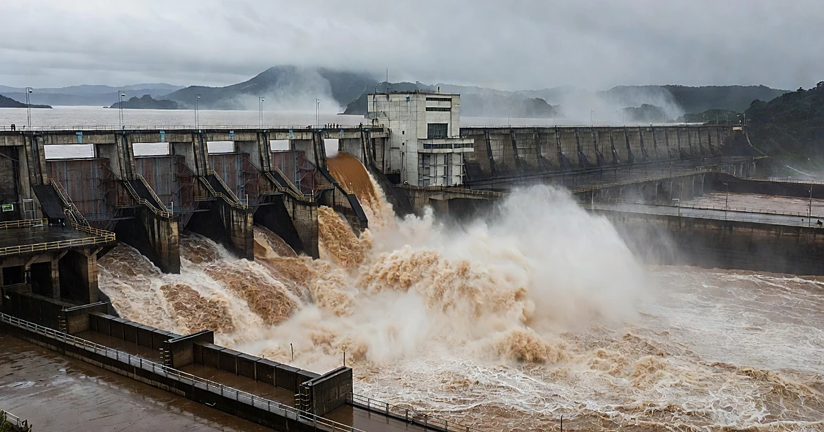 Massive water release through Itaipu Dam spillway gates with torrents cascading and mist rising during heavy rainfall