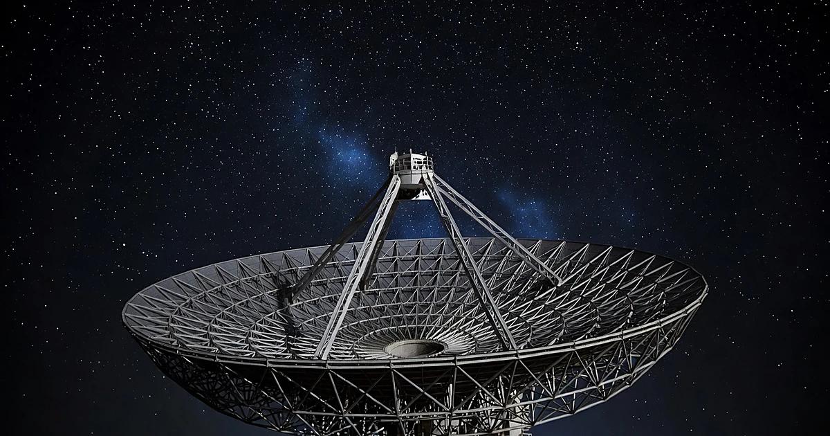 Large radio telescope dish angled toward starry night sky with illuminated framework